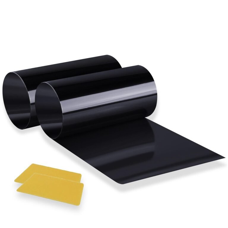 Two rolls of black film with two yellow adhesive pads